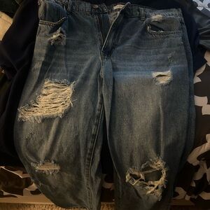 Distressed Blue Denim Jeans